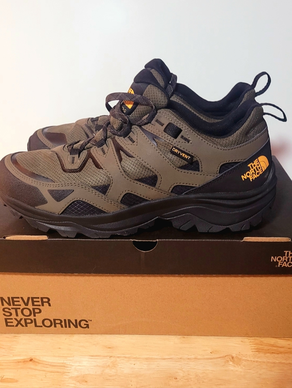 The North Face Men's Olive and Black Hiking Boots with Yellow Logo Accent